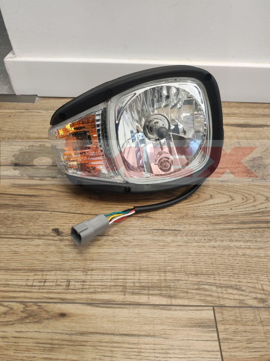 Lampa przednia prawa CAT 906H