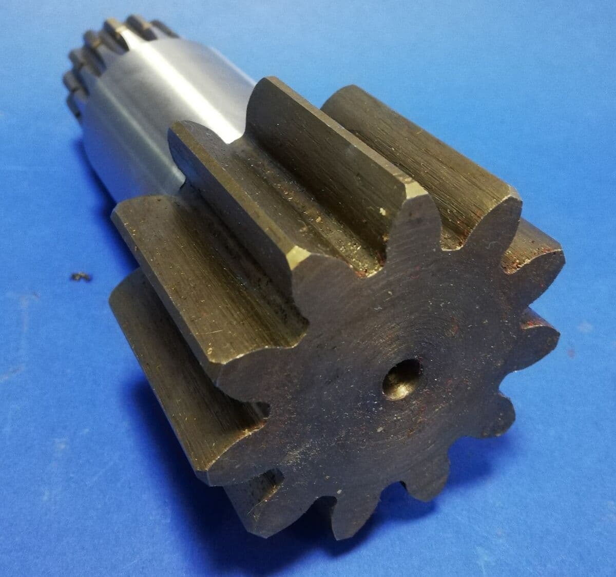 010530A Cat 302.5 Schwenkmotorwelle